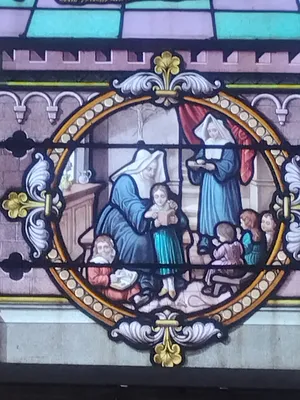 Vitrail Baie 17 : Saint-Vincent-de-Paul dans l'Église Saint-Erkonwald à Gonfreville-l'Orcher
