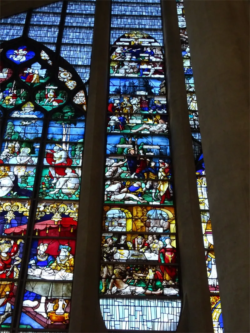 Vitrail Baie 6 : Oeuvres de Miséricorde dans l'église Sainte-Jeanne-d'Arc de Rouen
