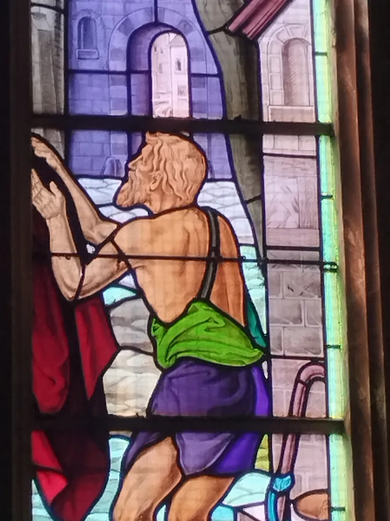 Vitrail Baie 4 : C'est Martin qui m'a vetu de ce manteau dans l'Église Saint-Léger à Saint-Léger-aux-Bois