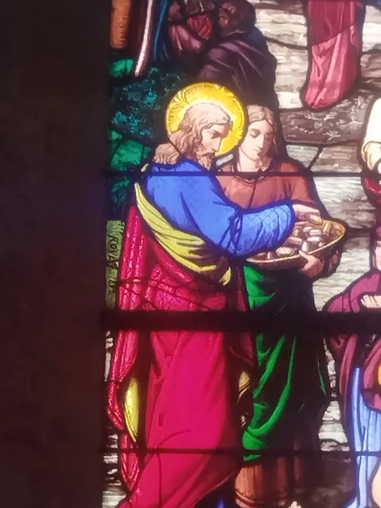 Vitrail Baie 1 : La multiplication des pains dans l'Église Saint-Erkonwald à Gonfreville-l'Orcher