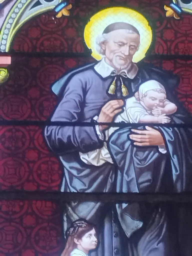 Vitrail Baie 17 : Saint-Vincent-de-Paul dans l'Église Saint-Erkonwald à Gonfreville-l'Orcher