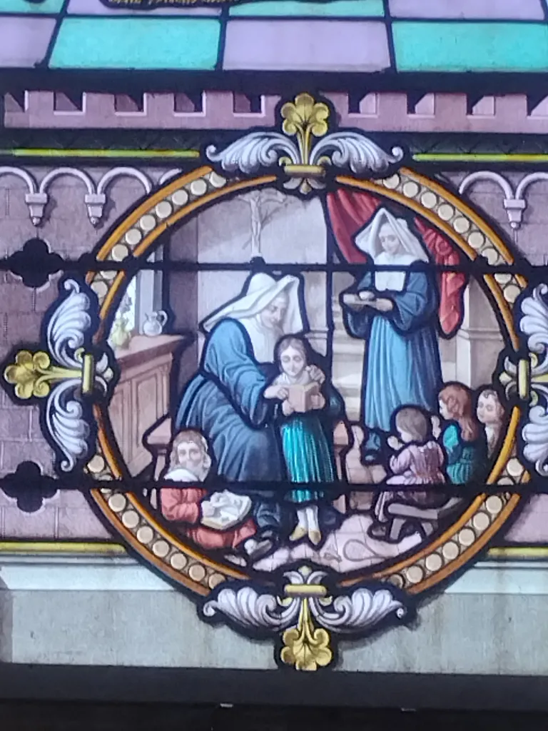 Vitrail Baie 17 : Saint-Vincent-de-Paul dans l'Église Saint-Erkonwald à Gonfreville-l'Orcher